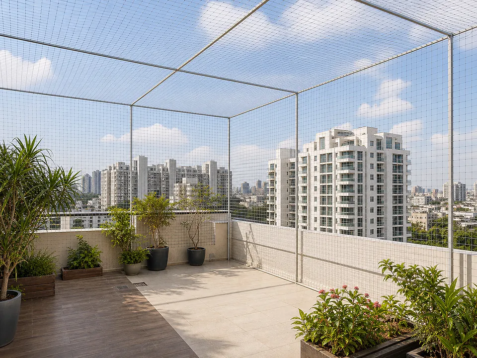 Terrace enclosed with safety netting on all sides